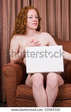 stock photo Pretty pale nude redhead with her laptop nude redhead