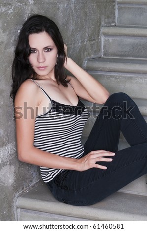Beautiful young Latina in a striped blouse