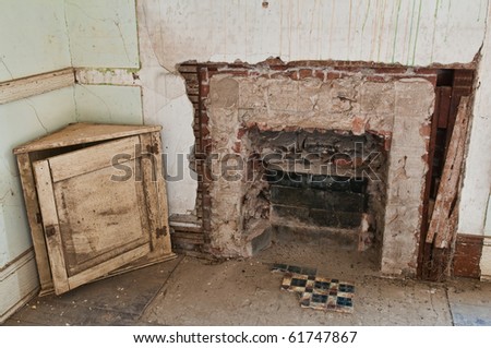 Old disused fireplace in an abandoned building