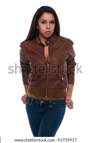 stock photo Pretty young petite Latina in a brown leather jacket