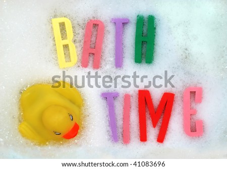 The words \'bath time\' written in foam letters.