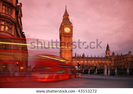Big Ben and the Houses of Parliament at Westminster, taken at sunset, with busy London traffic trails in the foreground.
