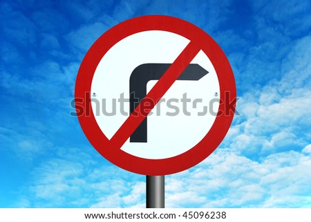 No Right Turn road sign, against a background of a bright blue summer sky.