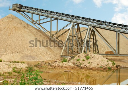 Industrial conveyor belt at gravel extraction pit