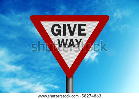 Photo realistic metallic, reflective \' give way\' sign, against a bright blue sky
