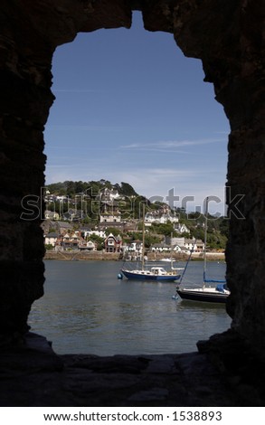 view toward kingswear with boats on the river dart looking through a window of bayards cove fort dartmouth devon england europe uk taken in july 2006