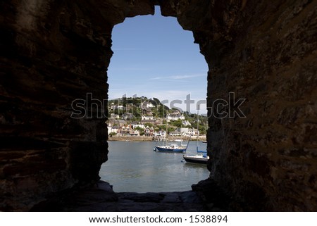 view toward kingswear with boats on the river dart looking through a window of bayards cove fort dartmouth devon england europe uk taken in july 2006
