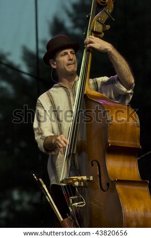 REDMOND, WA - AUG 11: Bass player Mark Schatz of Nickel Creek performs on stage at Marymoor Amphitheater August 11, 2006 in Redmond, Wa.