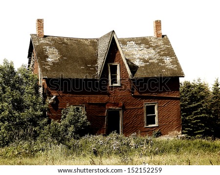 An old farm house, abandoned and falling down, southern Ontario, Canada.