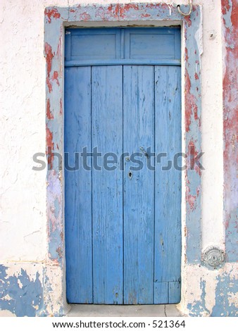 Blue wooden door, village in southern Portugal