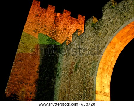City walls - medieval city walls - all light up at night.
