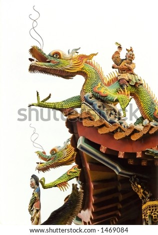 Dragon and human characters on a temple roof in southern Taiwan.