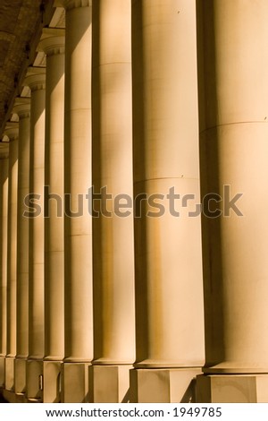 Classic columns in a collonade on the way into a railway station.