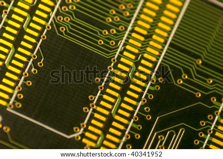 Closeup of circuits on a memory board. Limited focus.