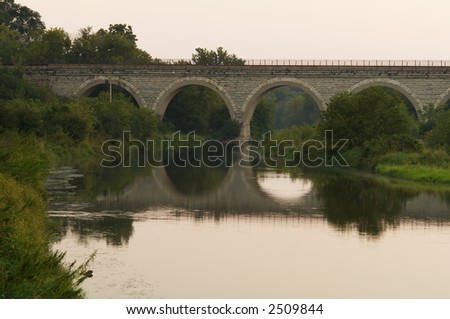 stone train bridge over river
