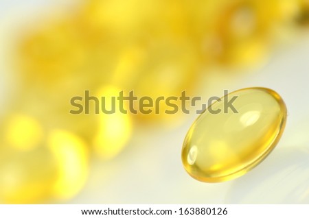 fish oil capsules isolated on white background