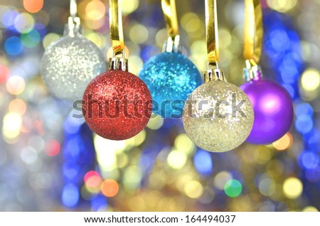 carnival decoration, colored hanging balls on bokeh background