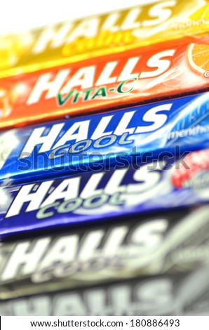 KWIDZYN, POLAND Ã¢Â?Â? MARCH 4 , 2014: Variety of Halls cough drops which are sold by Cadbury, now owned by Mondel?z International. Halls Brothers Company was founded in Britain in 1893