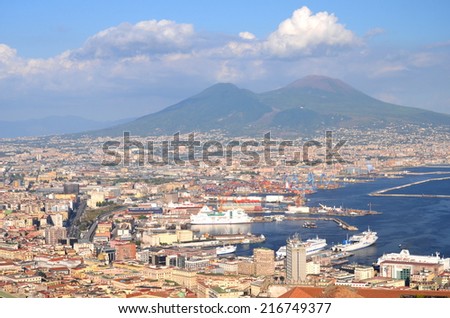 NAPLES, ITALY - AUGUST 17, 2014: Picturesque summer panorama of Naples and Vesuvius, Italy. Naples is the capital of Campania region and the third-largest municipality in Italy