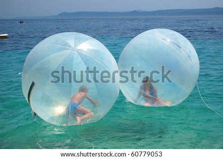 Children in air balls on Golden Cape in Croatia