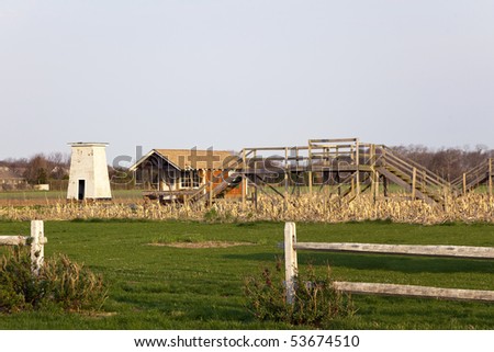Farm Structures. Small Silo, barn and elevated deck that overlooks the farm. Long Island, New York.