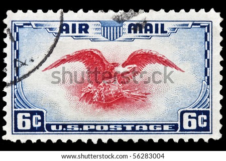 UNITED STATES - CIRCA 1930\'s : A stamp printed in United States. Eagle holding shield, olive branch and arrows. United States - CIRCA 1930\'s