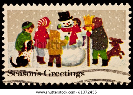 UNITED STATES - CIRCA 1980\'s : A stamp printed in United States. Kids Making a Snowman Christmas Issue. United States - CIRCA 1980\'s