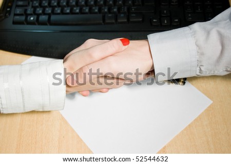 man shake hands with woman