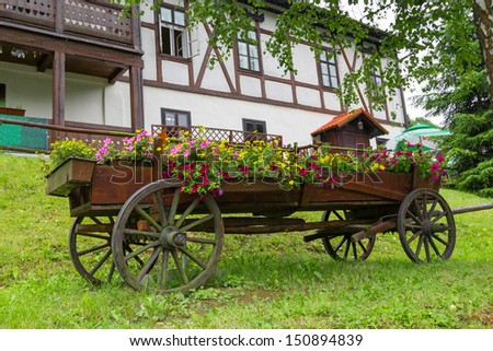 Old wooden cart with flowers, Zakopane in Poland