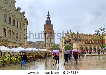 CRACOW, POLAND - JUNE 28: The main market square of the Old Town in Krakow on 28 June 2013. Main square in Krakow is the largest medieval town square in Europe.
