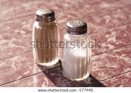 A Salt and pepper shaker pair