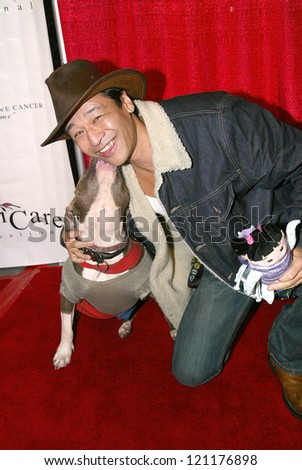 UNIVERSAL CITY - DEC. 4:Liam Stone & Bella the Movie Dog arrive at publicist Mike Arnoldi\'s birthday celebration &  Britticares Toy Drive for Children\'s Hospital on Dec. 4, 2012 in Universal City, CA.