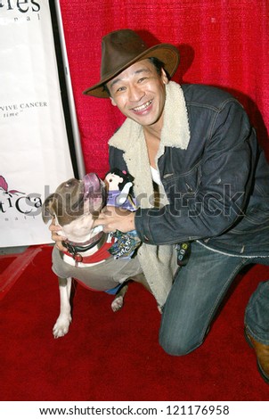 UNIVERSAL CITY - DEC. 4:Liam Stone & Bella the Movie Dog arrive at publicist Mike Arnoldi\'s birthday celebration &  Britticares Toy Drive for Children\'s Hospital on Dec. 4, 2012 in Universal City, CA.