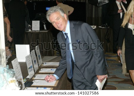 BEVERLY HILLS - MAY 7: Tony Denison checks out the silent auction items at The 12th Annual Golden Hearts Awards on Monday, May 7, 2012 at the Beverly Wilshire Hotel in Beverly Hills, CA.