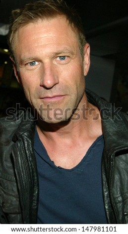SAN DIEGO, CA - JULY 19: Actor Aaron Eckhart arrives at the Lionsgate booth for an \
