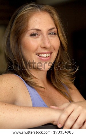 Head shot of a Blond Woman, indoors