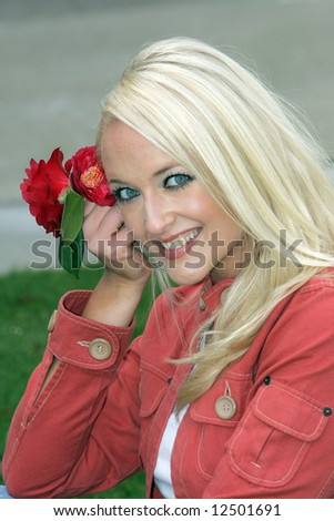 Blond female model with flower