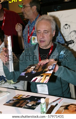 stock photo SAN DIEGO CA JULY 21 Brent Spiner signs autographs on