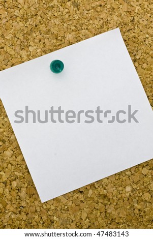 Yellow post it on a everyday corkboard. This is my corkboard.