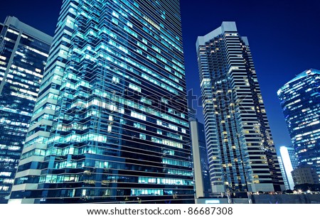 Tall office buildings by night