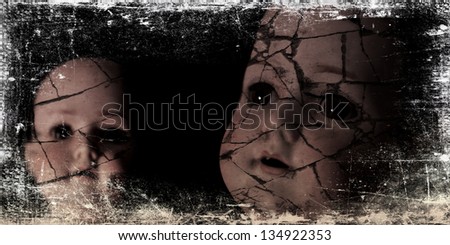 Spooky doll photograph. A spooky and disturbing image of two dolls on a grunge and old photo effect.