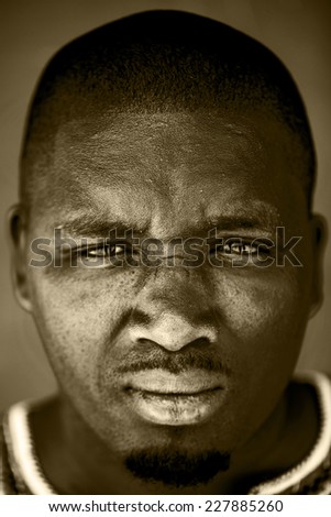 An portrait of a young Xhosa man in South Africa.