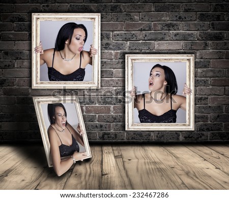 Woman trapped in frames. Abstract image of a beautiful woman trapped in a picture frame and making funny faces.