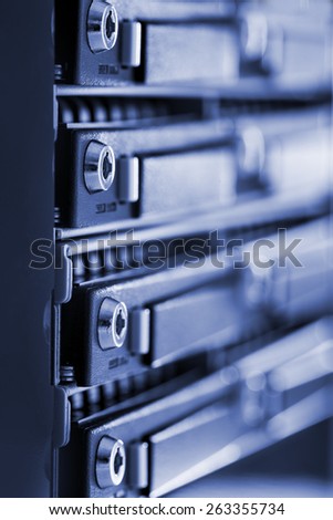 Hard drives in data center storing information.