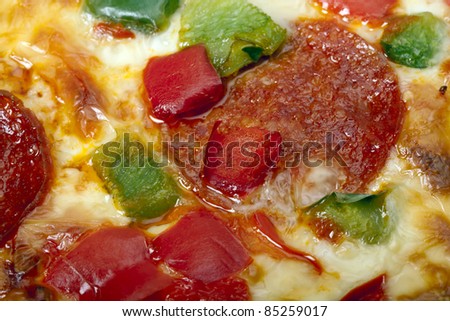 A close-up of an Italian pizza as an abstract food background. Pizza background.