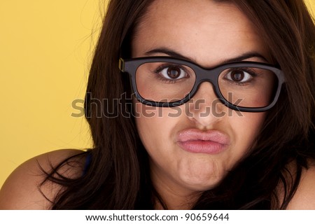 A funny faced brunet woman with gorges brow eyes. Funny face.