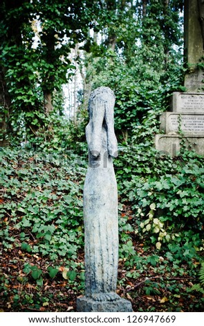 Cry statue on Highgate Cemetery, London, UK