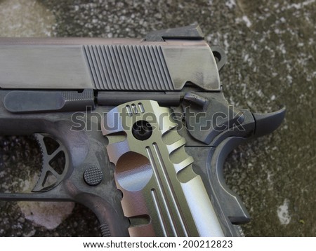 Detail of modifed 1911 45 acp pistol