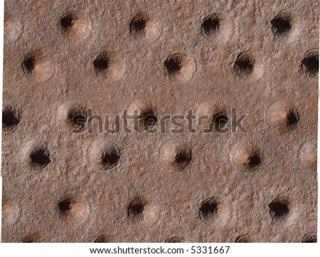 Rusted rivets on old boiler optical illusion