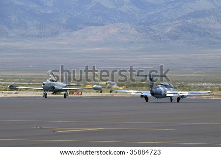 Three privately owned military jets taxiing at Wendover, Utah